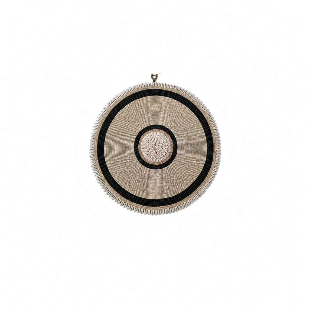 A 30 cm round piece on a white background, showing a natural-toned concentric surface, dark circular bands, a pale centre and fine fringe