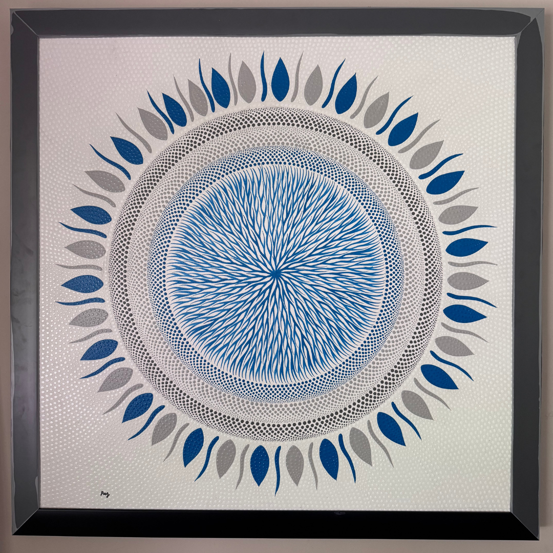 Framed artwork with a blue and gray circular design on a white background