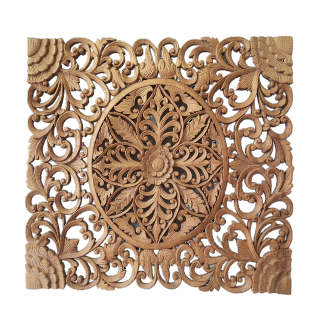 Decorative wooden panel with intricate carvings on a white background