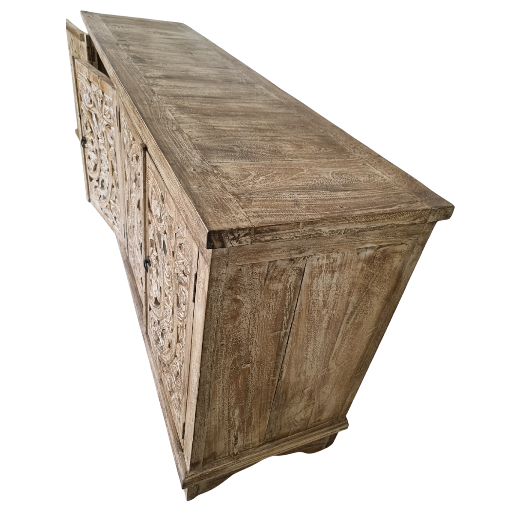 Balinese carved teak cabinet angled overhead view showing reclaimed timber top grain and side panel detail