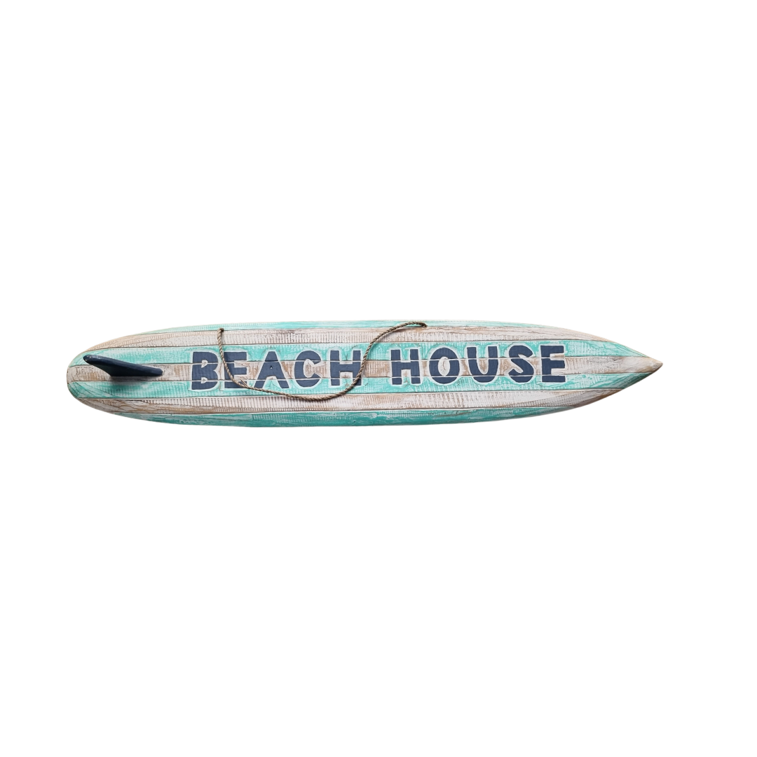 Turquoise-wash wooden coastal sign with BEACH HOUSE lettering and dark fin on a white studio background
