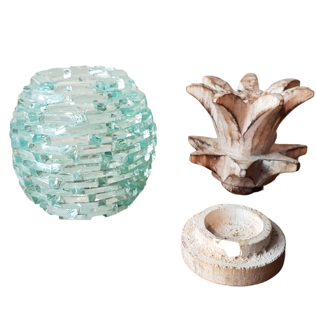Three disassembled components of the Boho Glass Pineapple Décor — aqua sea-glass mosaic body, whitewashed carved wooden leaf top, and timber base ring — showing the easy assembly of the handcrafted tropical boho tabletop sculpture by Azure Decor