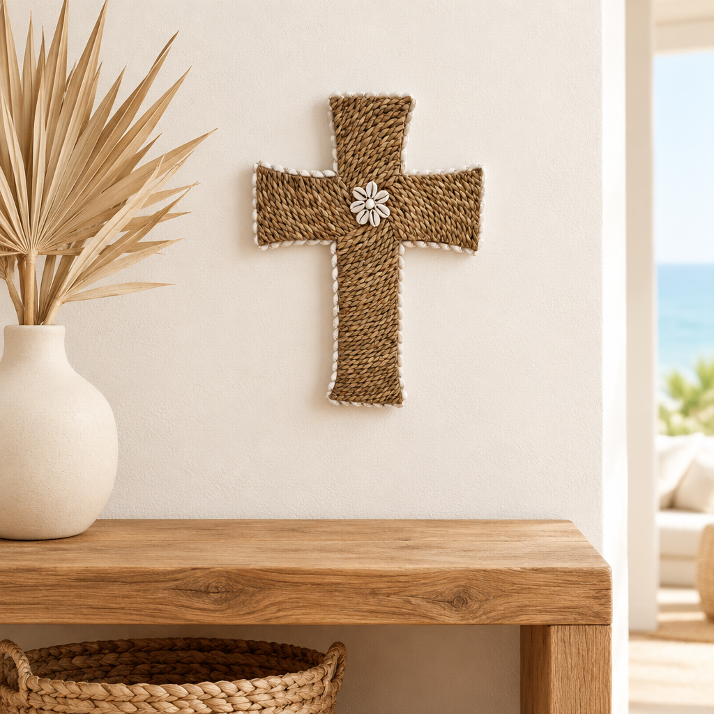  a coastal entryway with a timber console, ivory vase and dried palms.