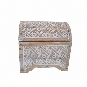 White wash carved wooden trinket chest with domed lid and floral diamond pattern carvings, white background