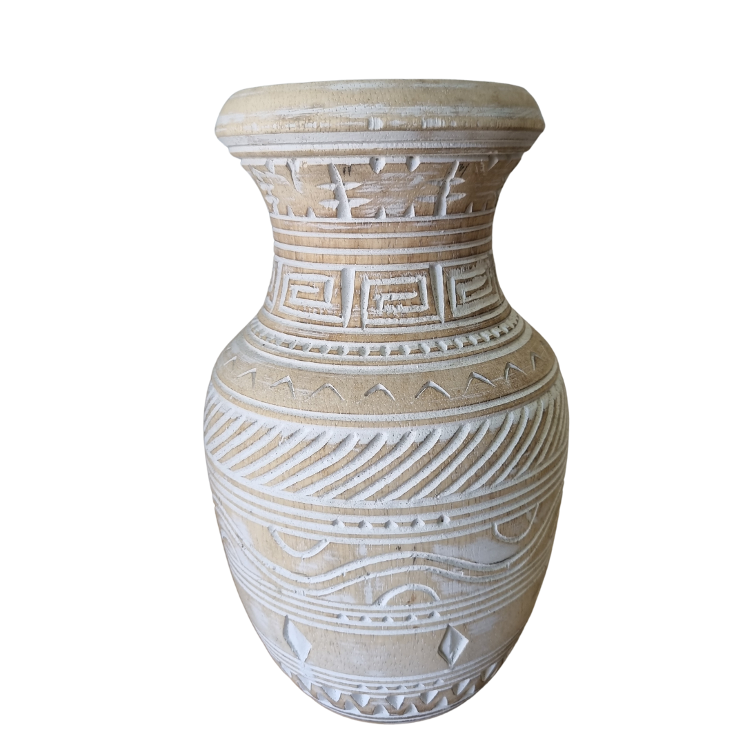 small hand carved wooden pot with tribal geometric carvings and warm sandy timber finish, on a white studio background

