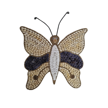 A wall-mounted Butterfly Shell Artwork made from assorted shells, predominantly in shades of brown and white, with a butterfly silhouette in the center. on white wall