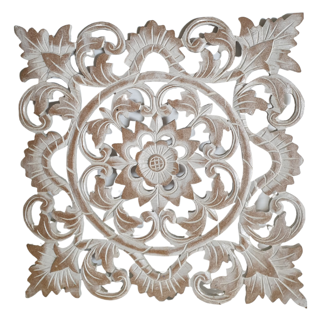 Decorative wall panel with intricate floral and leaf patterns on a white background