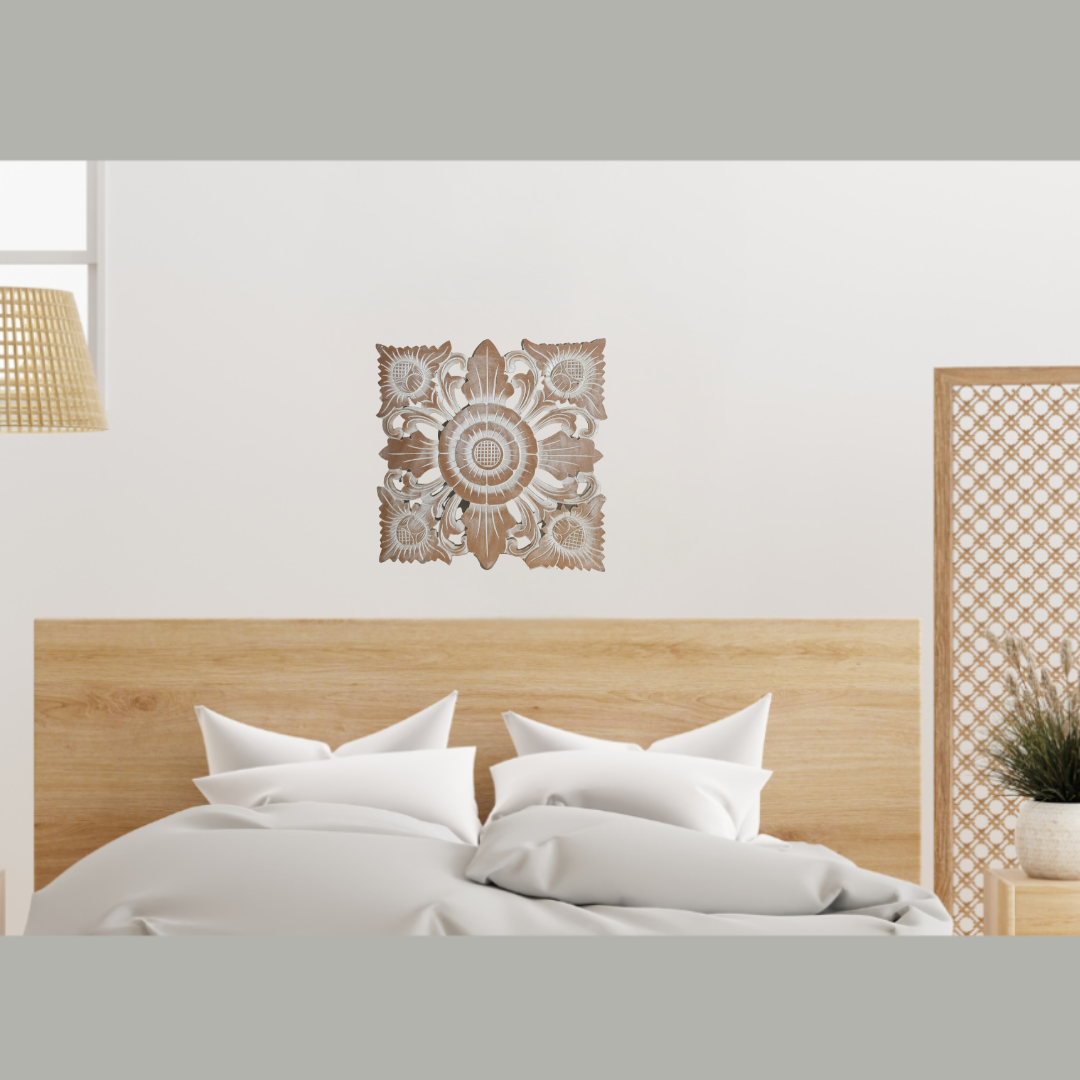 Decorative wall ART on a white wall above a bed with wooden headboard