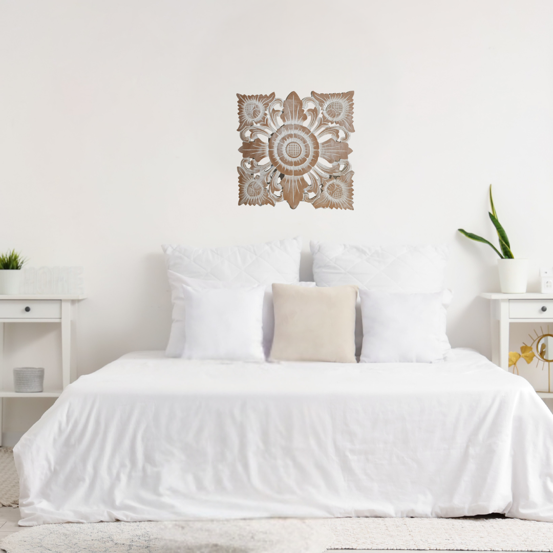 Decorative wall art above a bed in a bedroom setting