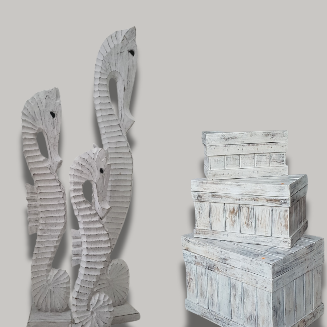 wooden seahorse statues a set of 3 pieces set next to a set of white wash box set