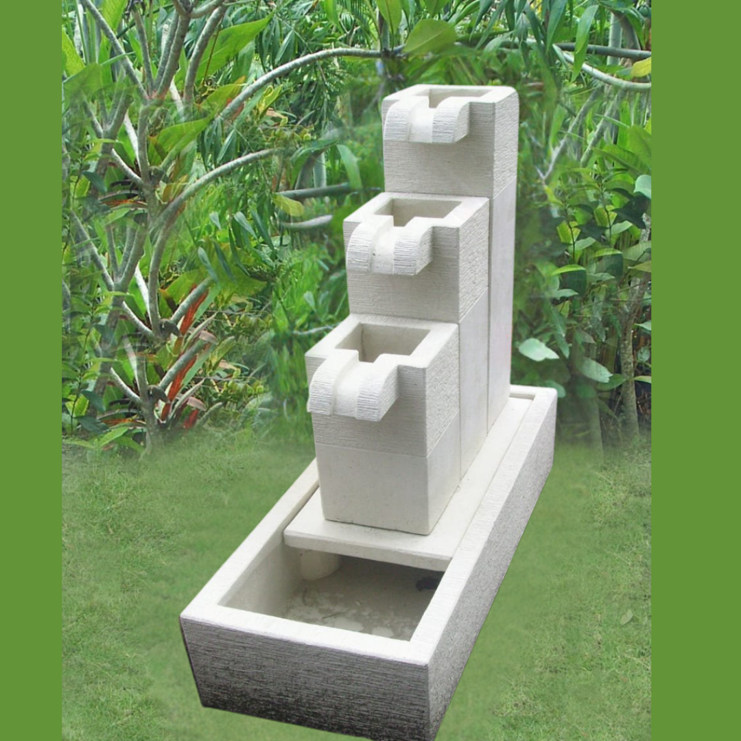 Stone outdoor fountain with water feature in a garden setting