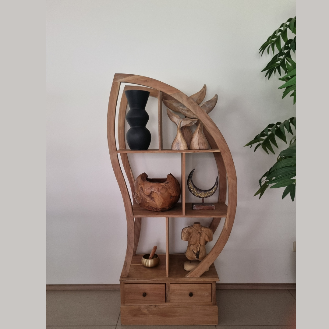 Wooden shelf with decorative items against a white wall