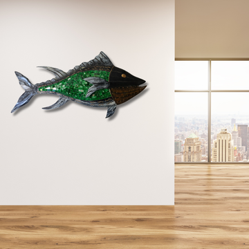 Decorative fish wall art on a white wall with a cityscape view through a window.