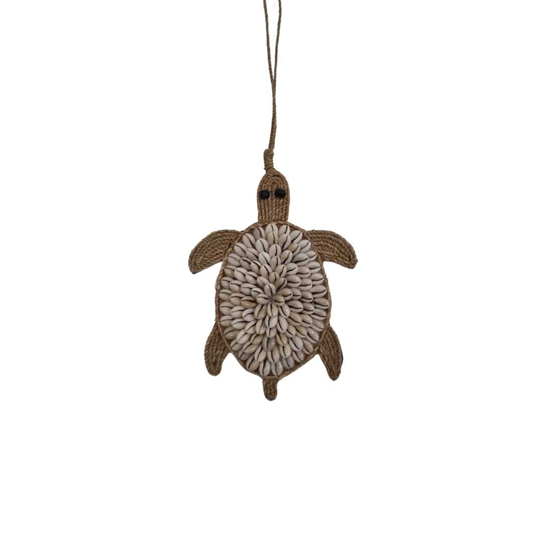 A collection of decorative garlands with sea-inspired designs including representations of, turtles,  laid out on a white surface.