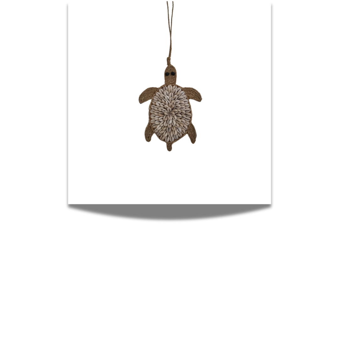 Coastal Shell Garland – Turtle style shell decor hanging on white wall