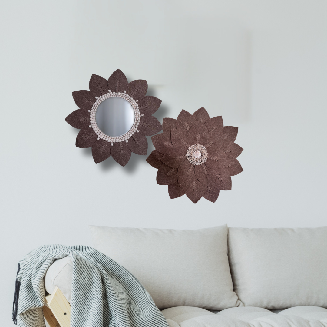 Boho coastal wall décor featuring macramé leaf mirror, macramé leaf wall art, and floral mirrors above a sofa in Australia.