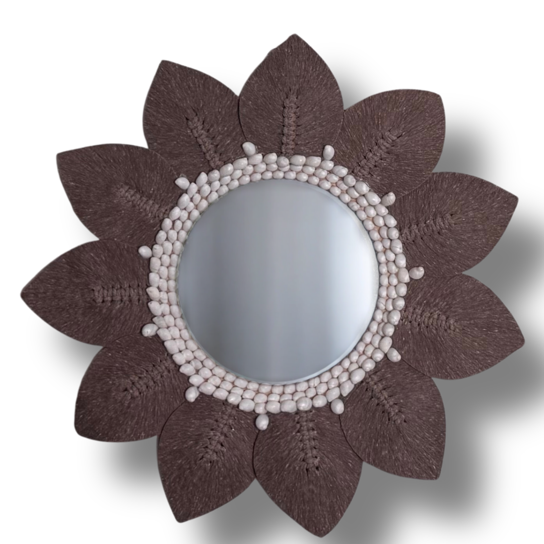 Macrame Decorative mirror with brown flower-like frame on a white background