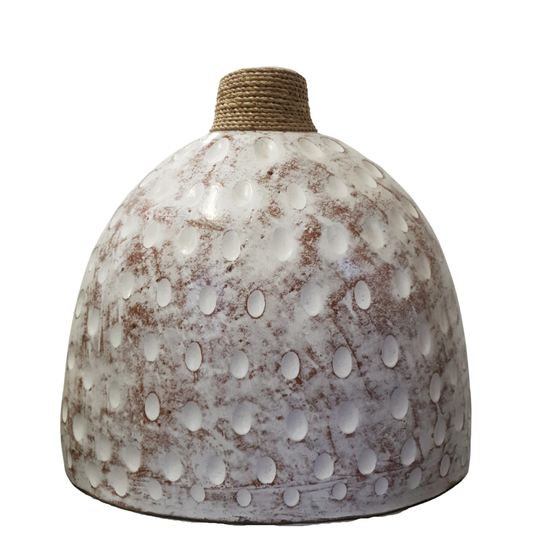 A ceramic table top vase with a whitewash and white wash finish and a jute rope detail on the top.