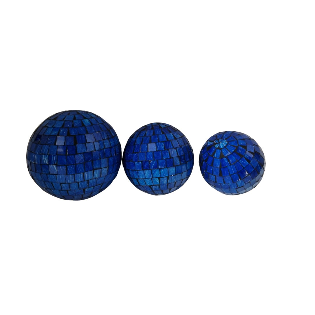 Three mosaic decorative balls in blue, each with a geometric pattern made of small tiles.