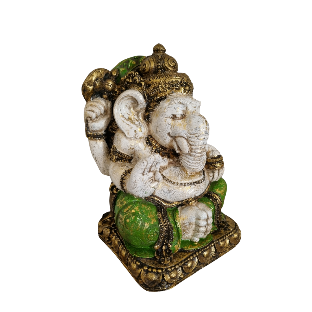 A vintage style Ganesh statue sculpture in multicolor, with a base, depicting the Hindu god Ganesha in a seated position with his hands in a praying gesture.