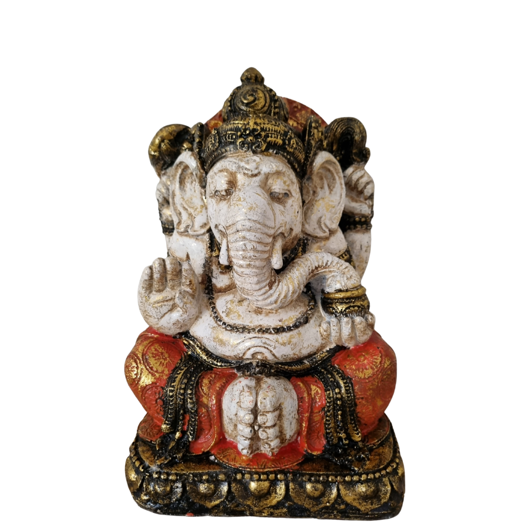 Statue of a deity with multiple heads and arms on a white background