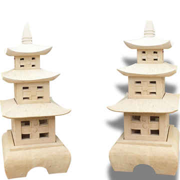 Two three-tier stone pagoda sculptures shown side by side, front and angled view, carved lattice windows, white background