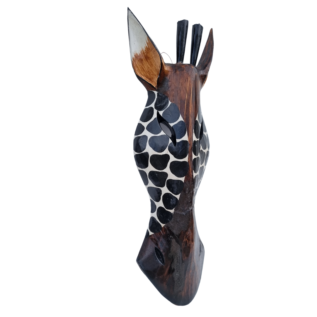 ArtSide profile of a dark hand-carved wooden giraffe mask with black painted spots