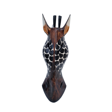 Front-facing carved wooden giraffe head with black and white spotted pattern on white background
