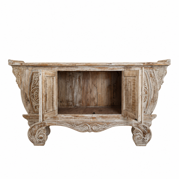 Hand-carved Balinese teak entryway cabinet with both doors open to show the storage space.