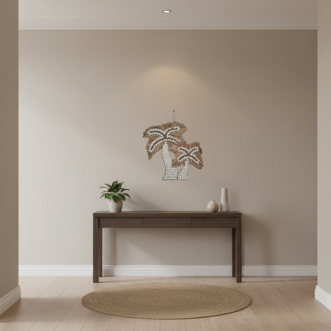 Handcrafted seagrass and white shell palm tree duo wall art 35x30cm styled in a neutral hallway above a dark timber console