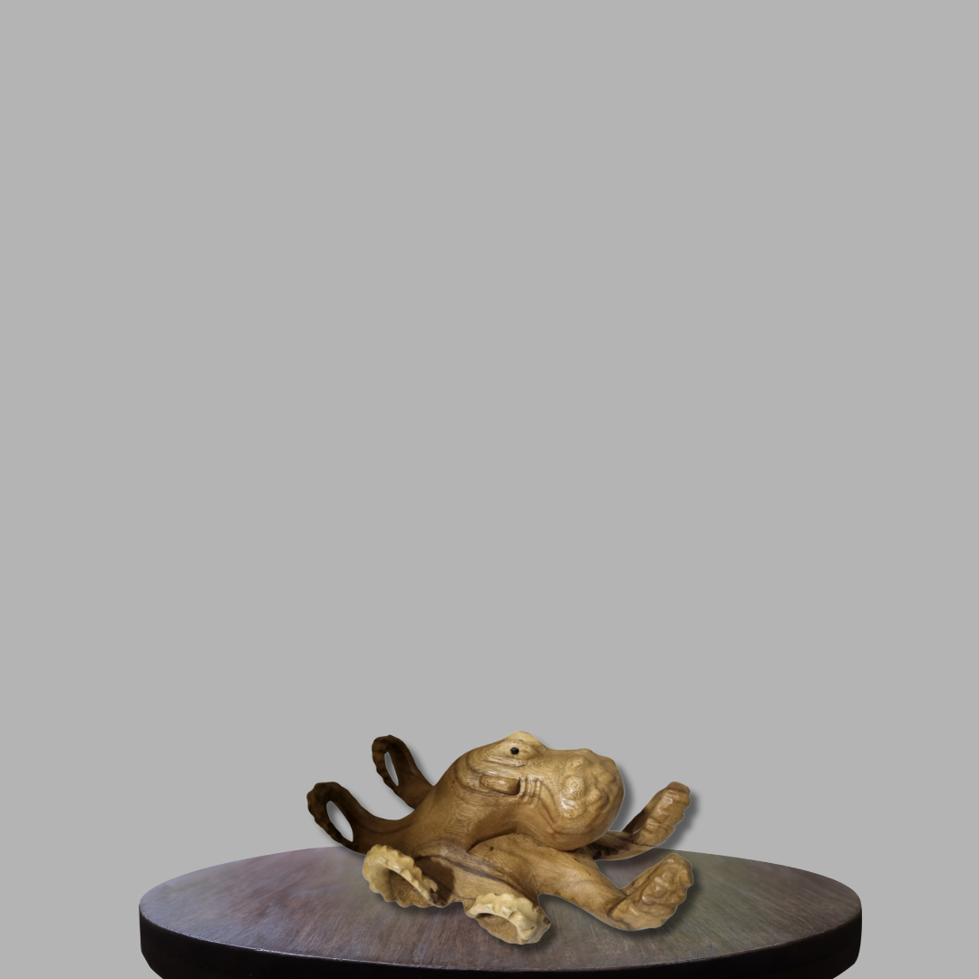 Handcrafted Solid Timber Octopus Sculpture – Style 1 – light natural wood tone with smooth rounded body and spread tentacles, displayed on dark round base | Azure Decor