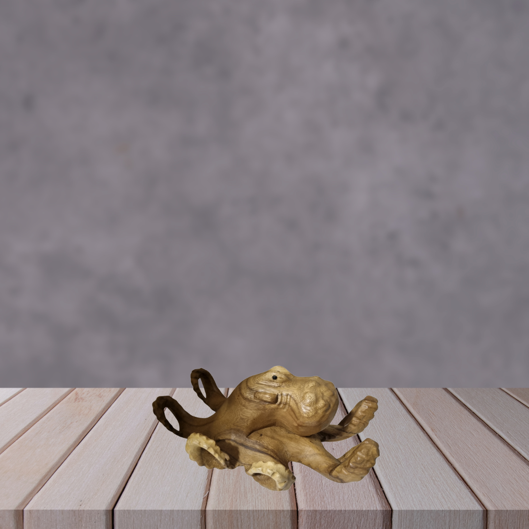 Handcrafted Solid Timber Octopus Sculpture – Style 1 – light natural wood tone with smooth rounded body and spread tentacles, displayed on dark round base | Azure Decor