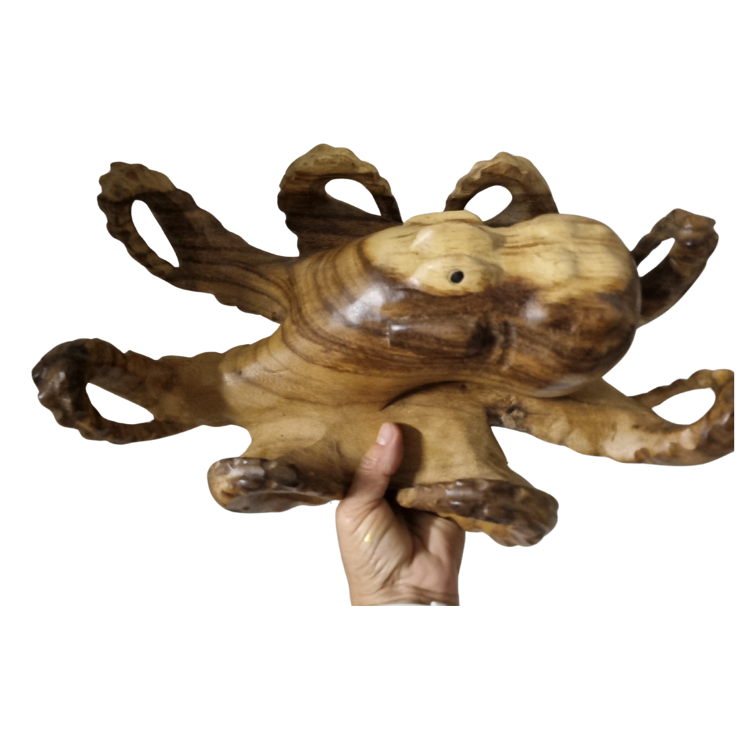 Handcrafted Solid Timber Octopus Sculpture – Style 2 – rich dark wood grain with wide-spread curling tentacles and polished rounded body, shown hand-held for scale | Azure Decor