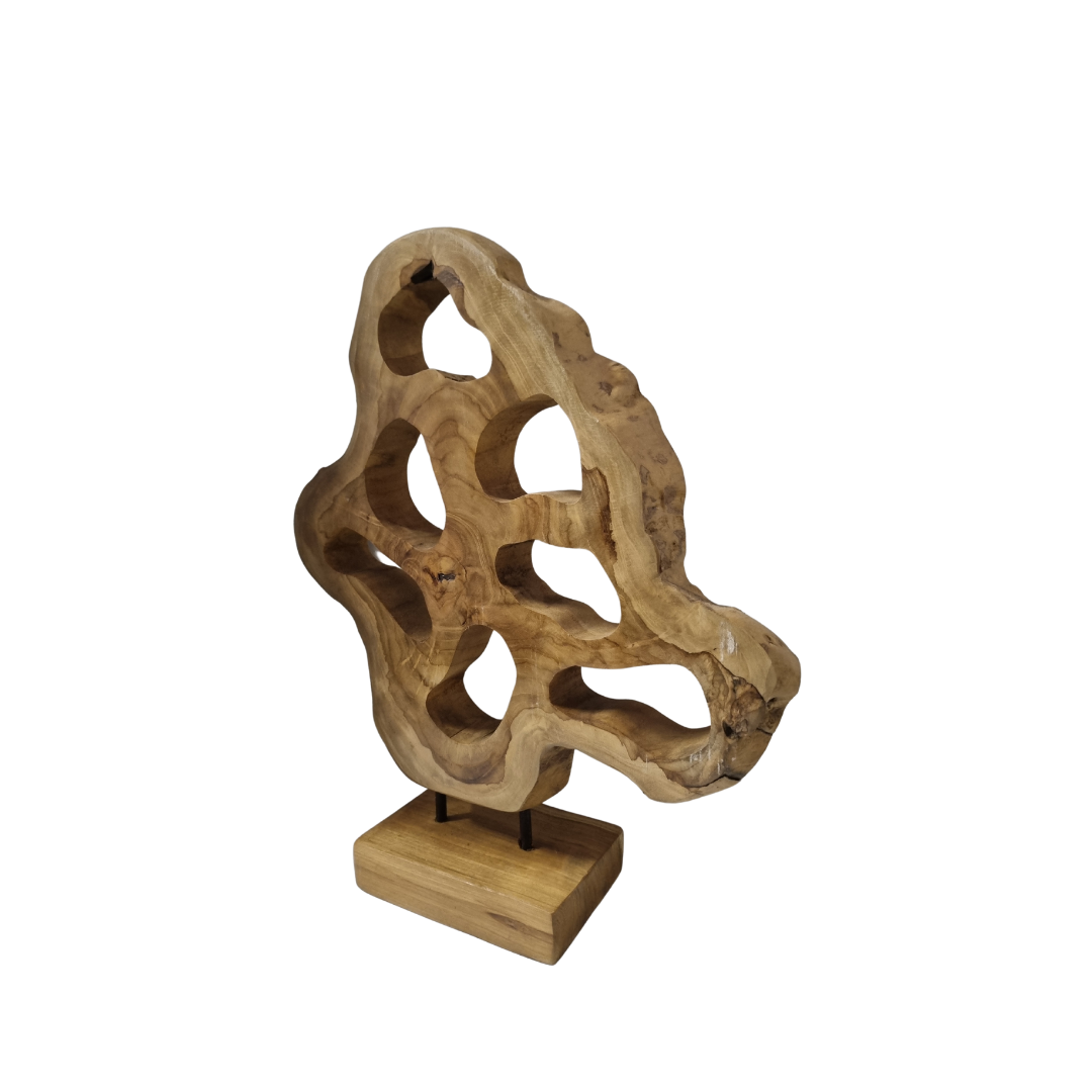 A handcrafted teak wood table top sculpture with intricate carvings, mounted on a wooden base.