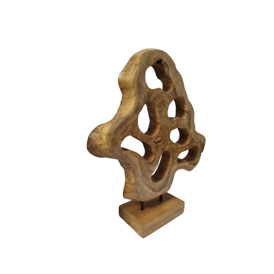 A handcrafted teak wood table top sculpture with intricate carvings, mounted on a wooden base.