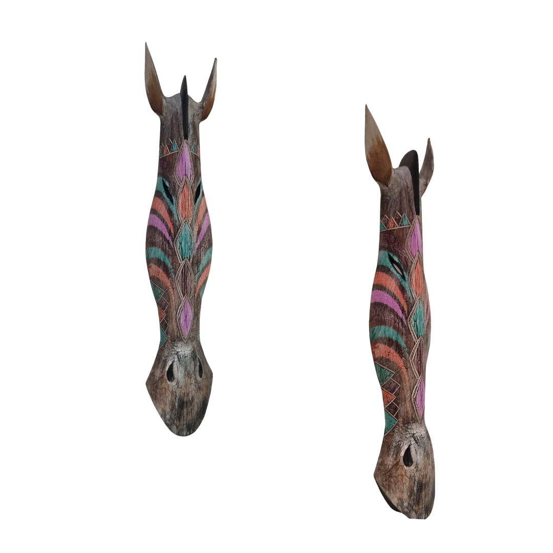 Zebra wall art featuring head sculptures shown from two angles, with colorful patterned detailing on a white background.