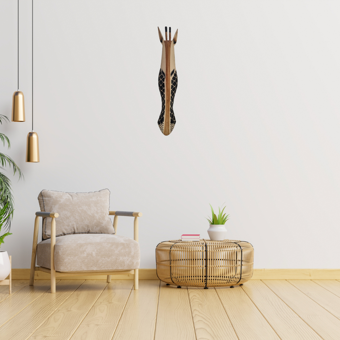 Handcrafted wooden giraffe style wall mask – natural tone with black net pattern – mounted on white wall in coastal boho living room with rattan furniture and gold pendant lights – 100cm African style wall art Australia"