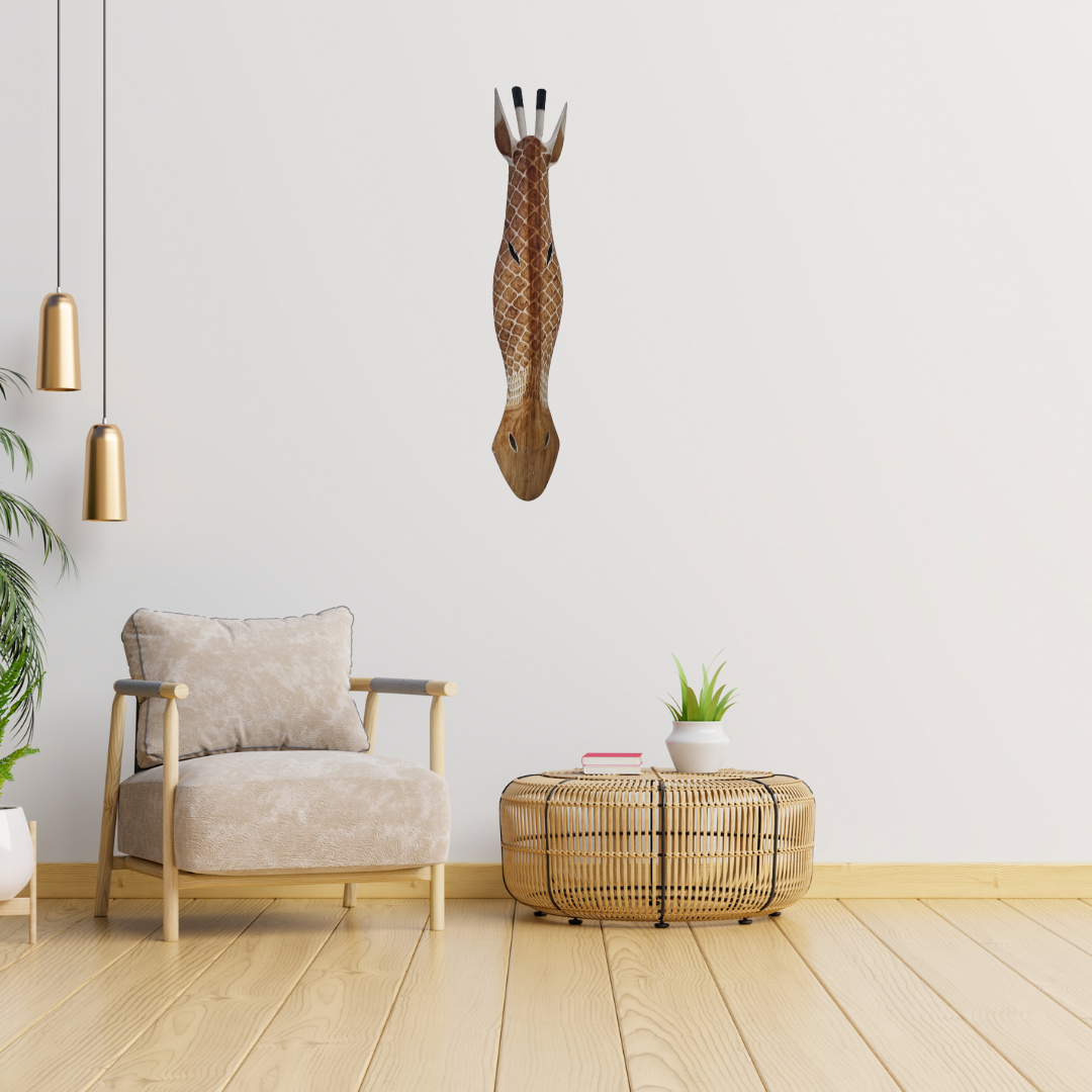 Handcrafted wooden giraffe style wall mask mounted in a modern living room with beige armchair and woven coffee table – 100cm African style wall art Australia