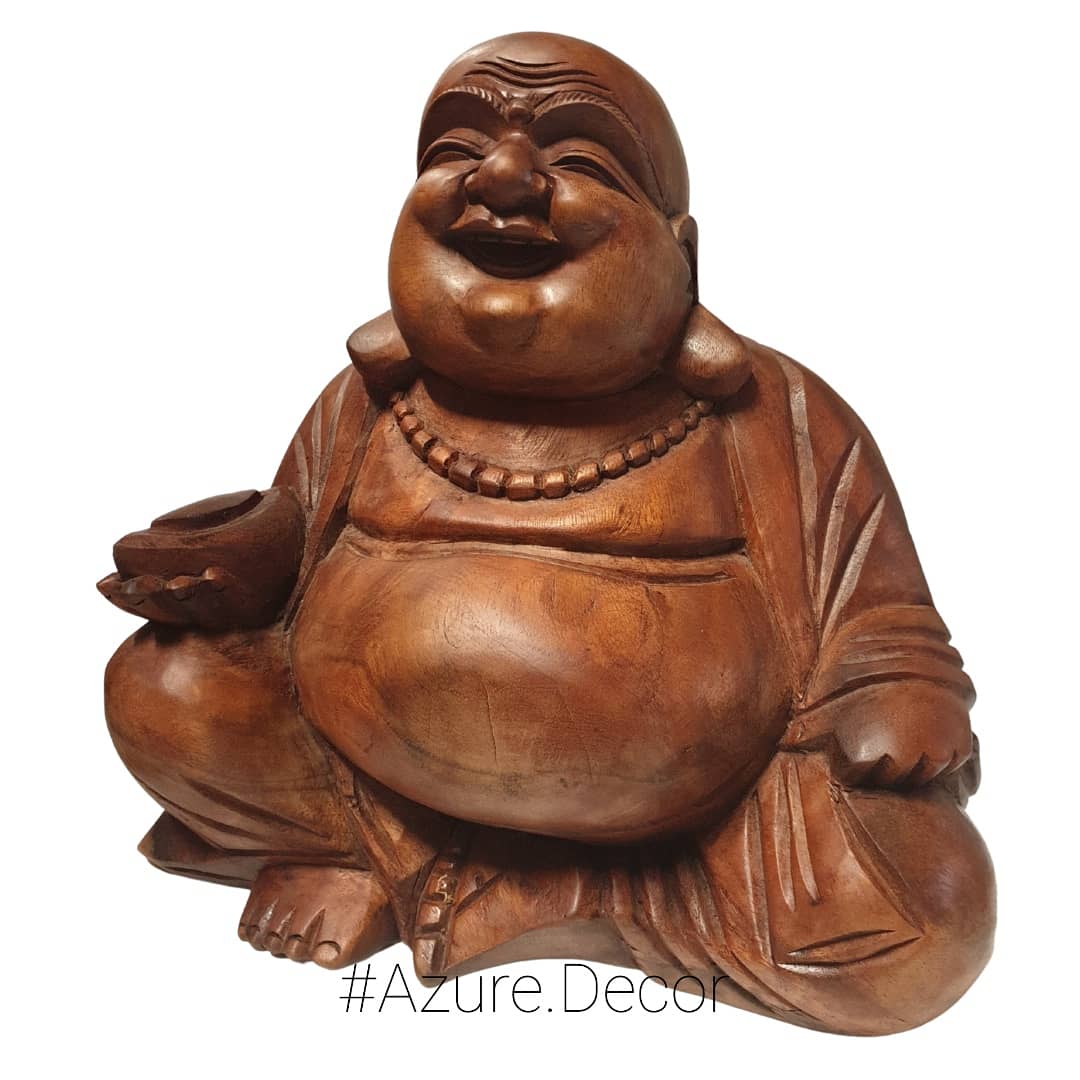A wooden statue of a smiling Buddha, known as the Happy Buddha or Laughing Buddha, sitting with a beige and brown color palette.