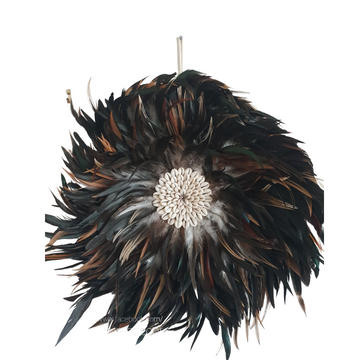 Handcrafted Balinese JUJU Hat Wall Hanging with dark feathers and cowrie shell centre, boho wall décor 40–50 cm, styled in a coastal boho interior