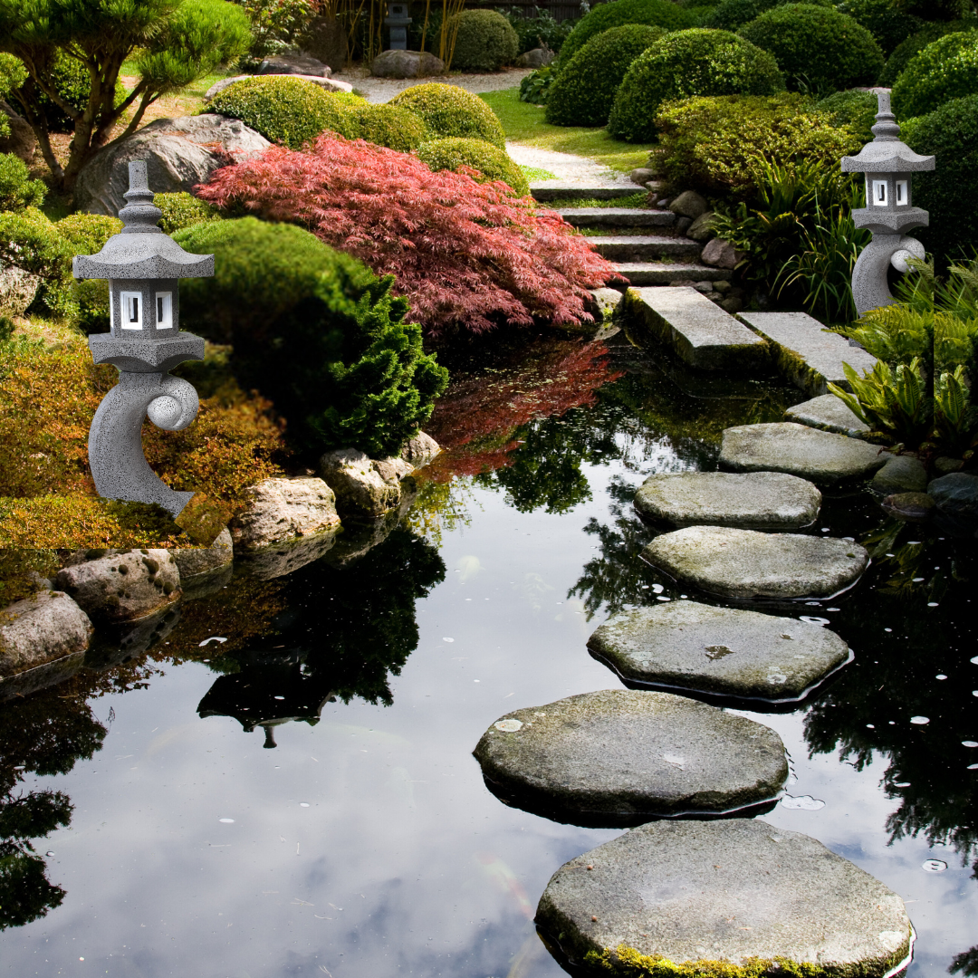 2 Garden Lanterns set in a Japanese Style Garden