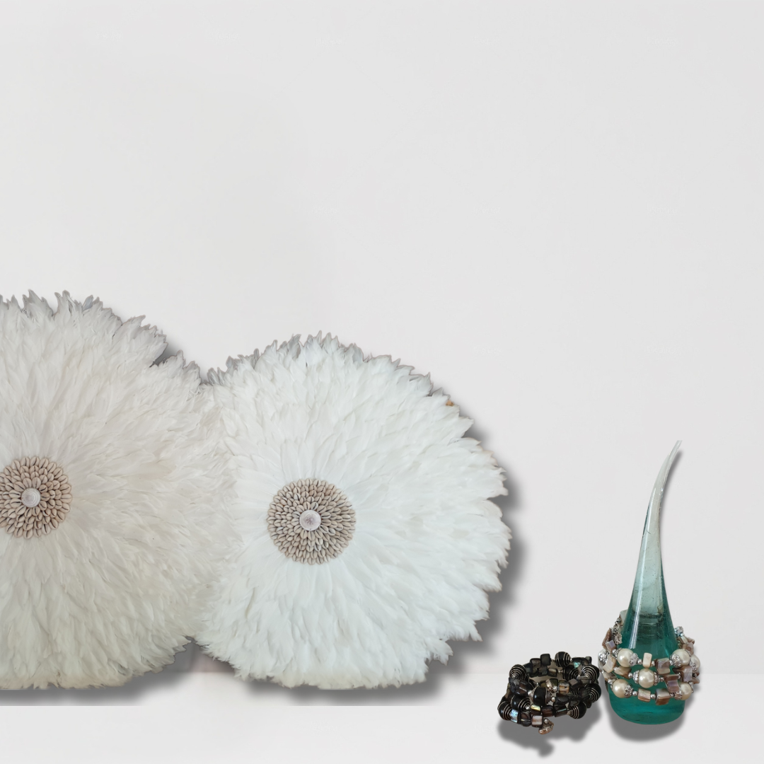 Decorative items including white floral-like objects and a teal vase with beads on a light gray background