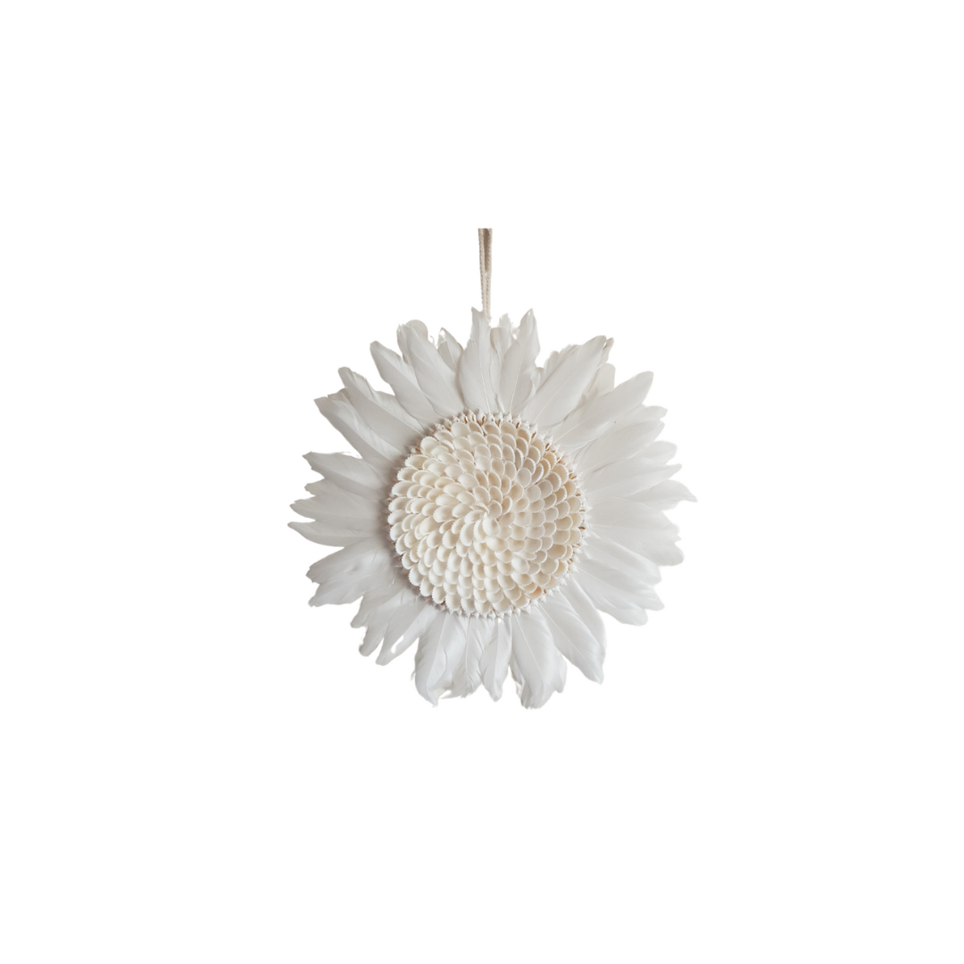 Juju Hat White Design with layered white feathers and a textured shell centre on a white background