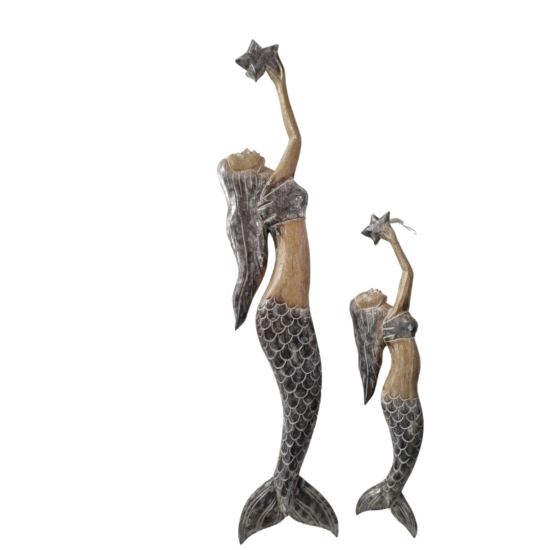 two mermaids 1 large 1x smallHandcrafted wooden mermaid wall art holding a starfish, displayed on a white wall, rustic coastal décor