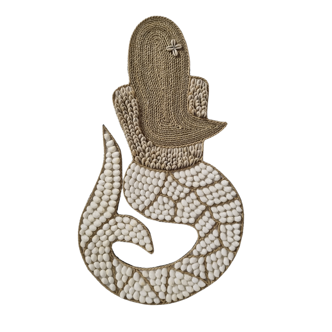 Mermaid-shaped hanging with woven jute hair, a small shell flower and a curled tail covered in rounded white shells.