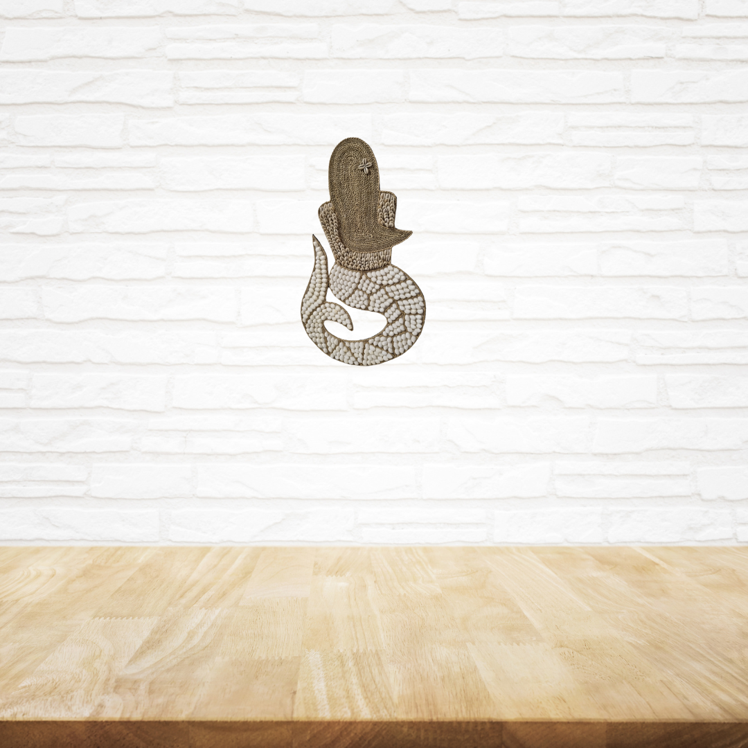 Wooden table with a decorative item on a white textured wall