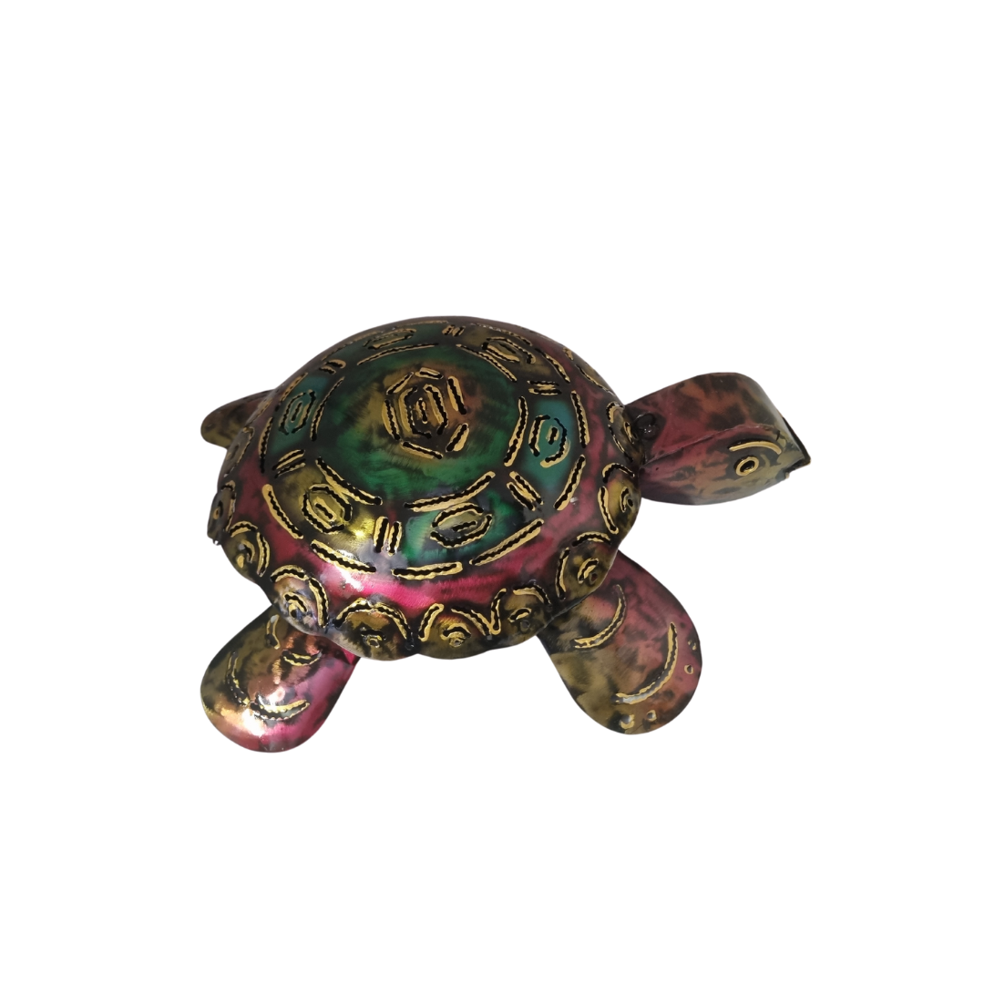 Decorative turtle figurine with multicolored finish on a white background
