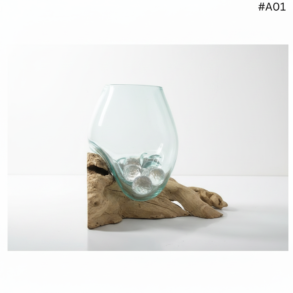Clear glass vase with pebbles on a piece of driftwood against a white background