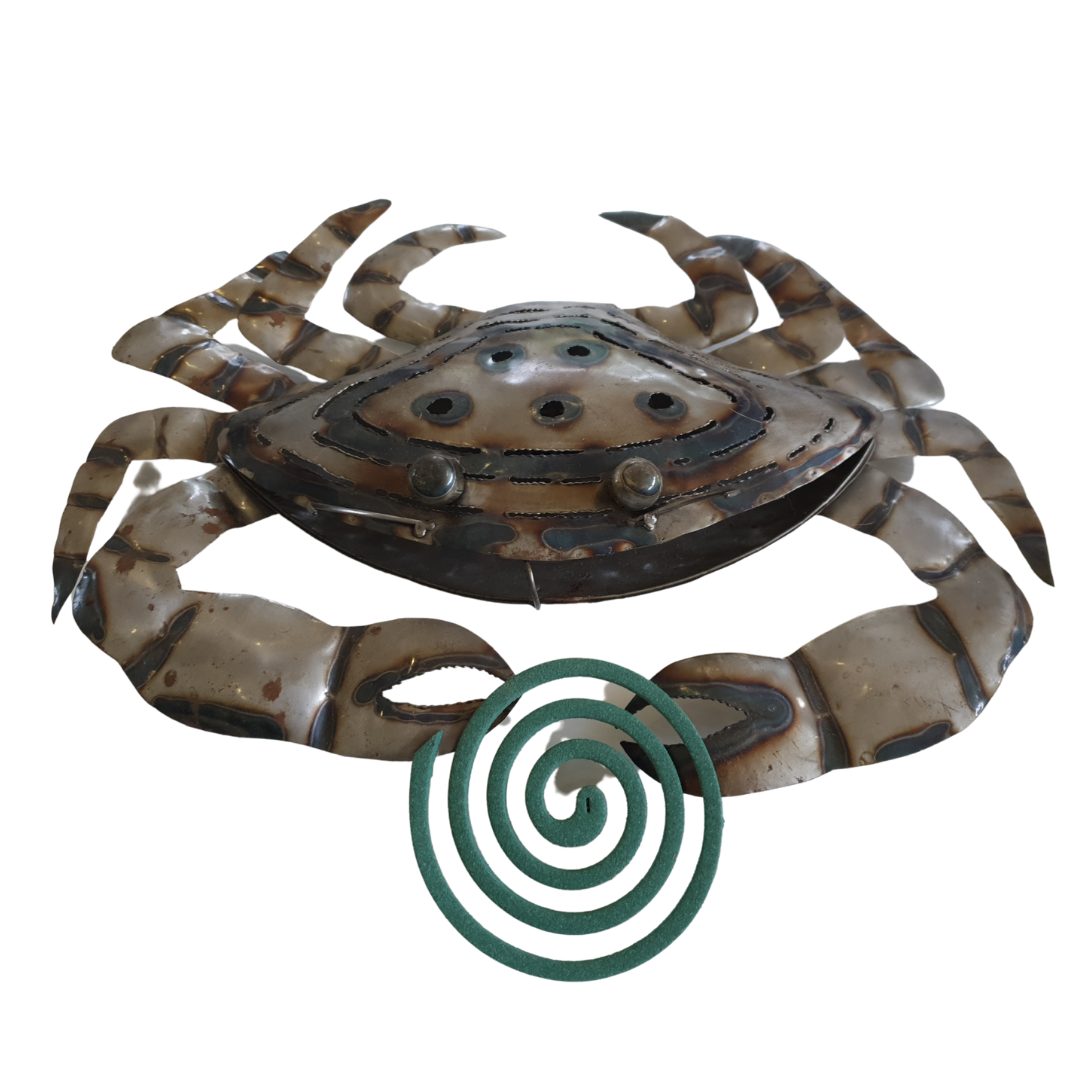 Silver-toned metal ornament with weathered finish, closed top and large claws on white background with a coil 