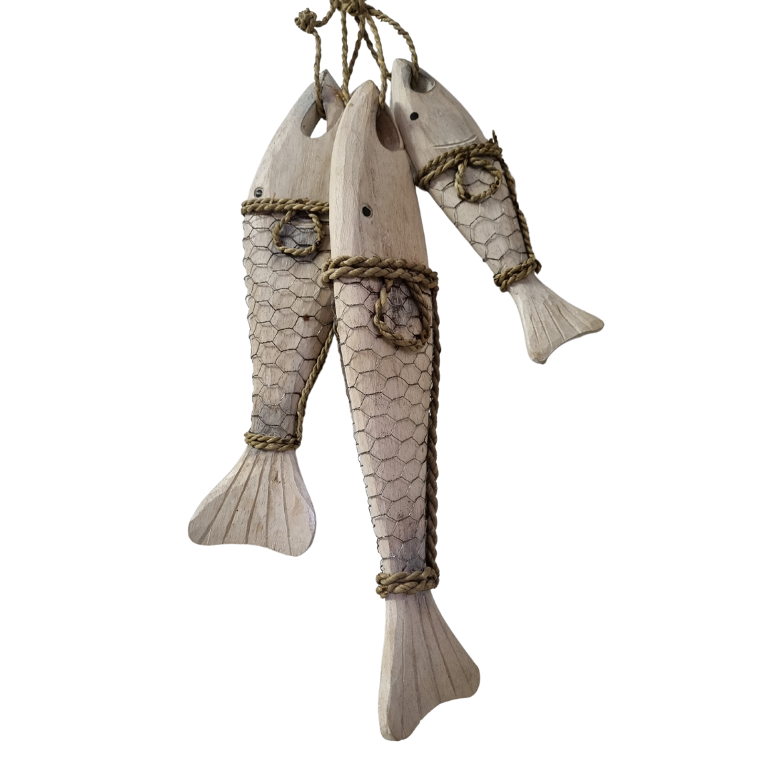 Nautical fish hanging decor — set of three whitewashed wooden fish with wire mesh and jute rope, displayed against white background